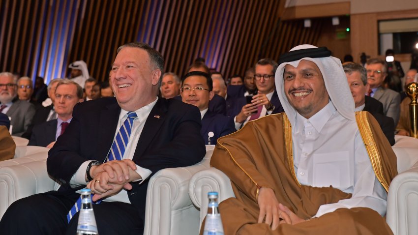 (L to R) US Secretary of State Mike Pompeo and Qatar’s Deputy Prime Minister and Minister of Foreign Affairs Sheikh Mohammed bin Abdulrahman al-Thani attend the signing of a US-Taliban agreement in the Qatari capital Doha on February 29, 2020. – Washington and the Taliban are set to sign a landmark deal in Doha that would see them agree to the withdrawal of thousands of US troops from Afghanistan in return for insurgent guarantees. (Photo by Giuseppe CACACE / AFP) (Photo by GIUSEPPE CACACE/AFP via Getty Images)