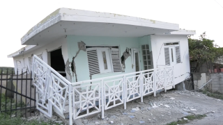A damaged house sits in Guanica, Puerto Rico, after a 5.8 magnitude earthquake hit off the southern coast of Puerto Rico on Monday morning, Jan. 6, 2019.