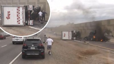 Dramático video: liberan a hombre que quedó atrapado en camión en llamas