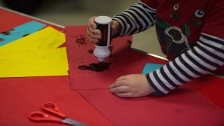 Pre-school aged boy painting