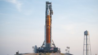 NASA’s Space Launch System (SLS) rocket with the Orion spacecraft aboard is pictured.