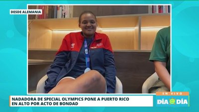 Nadadora boricua de Special Olympics ayuda a competidora a terminar su prueba