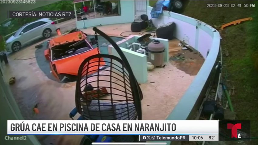 Captado en video: grúa cae en la piscina de una residencia en Naranjito