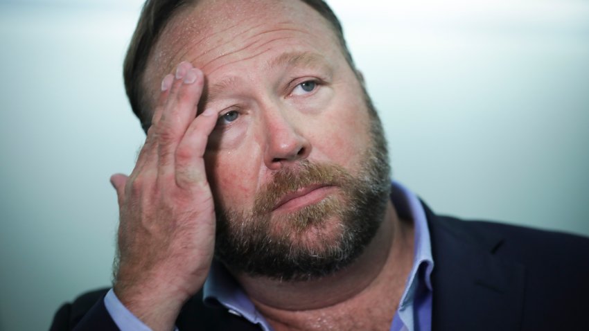 WASHINGTON, DC – SEPTEMBER 5: Alex Jones of InfoWars talks to reporters outside a Senate Intelligence Committee hearing concerning foreign influence operations’ use of social media platforms, on Capitol Hill, September 5, 2018 in Washington, DC. Twitter CEO Jack Dorsey and Facebook chief operating officer Sheryl Sandberg faced questions about how foreign operatives use their platforms in attempts to influence and manipulate public opinion. (Photo by Drew Angerer/Getty Images)