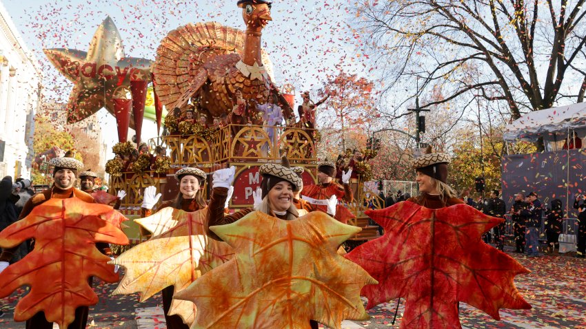 Parade performers lead the Tom Turkey float down Central Park West at the start of the Macy’s Thanksgiving Day parade, Thursday, Nov. 23, 2023, in New York. (AP Photo/Jeenah Moon)