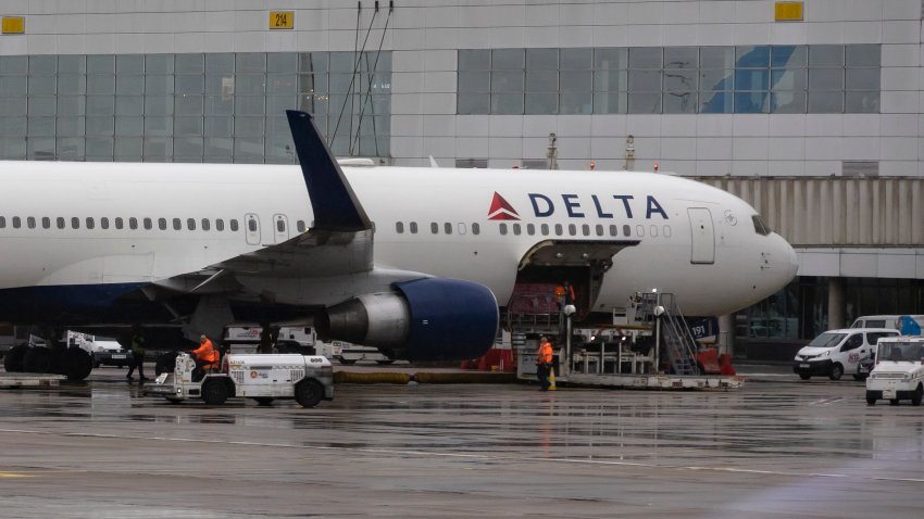 Medium shot of Delta plane at gate