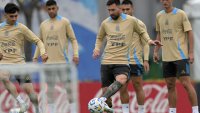 Argentina’s forward Lionel Messi passes the ball during a training session in Ezeiza, Buenos Aires province, on October 14, 2024, on the eve of the FIFA World Cup 2026 qualifier football match against Bolivia. (Photo by JUAN MABROMATA / AFP) (Photo by JUAN MABROMATA/AFP via Getty Images)