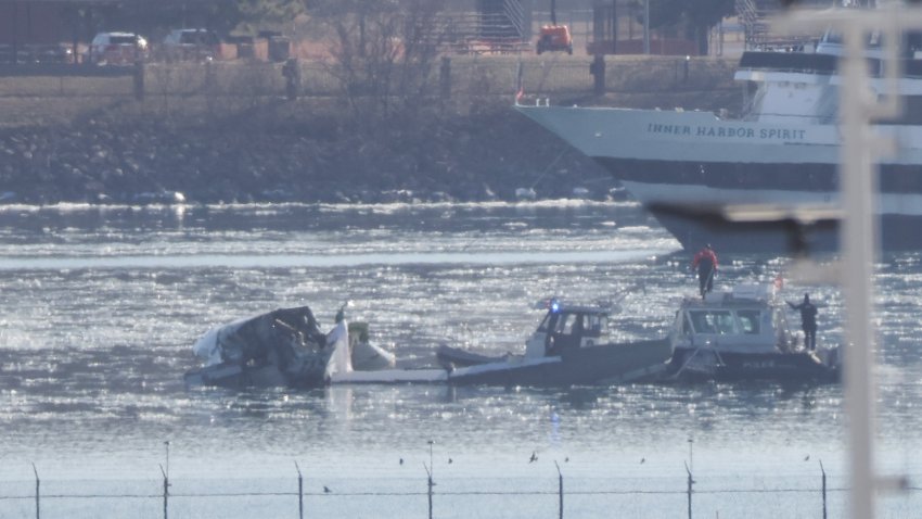 ARLINGTON, VIRGINIA – JANUARY 30:  Emergency response units search the crash site of the American Airlines plane on the Potomac River after the plane crashed on approach to Reagan National Airport on January 30, 2025 in Arlington, Virginia. The American Airlines flight from Wichita, Kansas collided with a military helicopter while approaching Ronald Reagan National Airport. Dozens of people have died in the midair collision. (Photo by Tasos Katopodis/Getty Images)