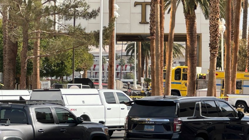 Police block the area after a vehicle caught fire and exploded outside the lobby of President-elect Donald Trump’s hotel Wednesday, Jan. 1, 2025.   (AP Photo/Ty ONeil)