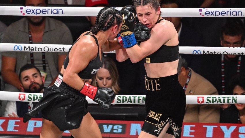 ARLINGTON, TEXAS – NOVEMBER 15: Katie Taylor (right) and Amanda Serrano (left) exchange punches during their super lightweight world titles of the Premiere Boxing Championship on Friday night at AT&T Stadium in Arlington, Texas, United States on November 15, 2024. (Photo by Tayfun Coskun/Anadolu via Getty Images)