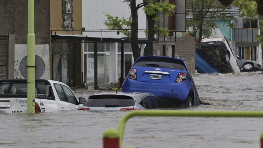 Vehicles are flooded after a powerful storm struck the city of Bahia Blanca, 600 km south of Argentina’s capital, on March 7, 2025. The severe rainfall left at least six dead and triggered mass evacuations, inundated hospitals, and caused sections of asphalt to collapse. (Photo by PABLO PRESTI / AFP) (Photo by PABLO PRESTI/AFP via Getty Images)