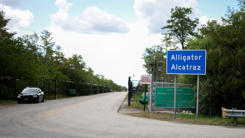 OCHOPEE, FLORIDA – AUGUST 03: The entrance to the state-managed immigration detention center dubbed Alligator Alcatraz, located at the Dade-Collier Training and Transition Airport in the Florida Everglades on August 03, 2025 in Ochopee, Florida. Faith leaders led prayer for those being held within the facility.  (Photo by Joe Raedle/Getty Images)