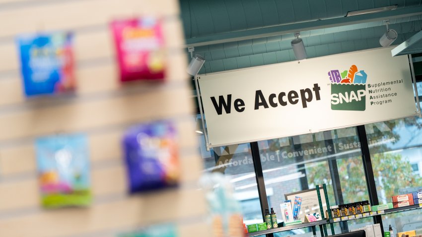 Supplemental Nutritional Assistance Program (SNAP) signage at a grocery store in Dorchester, Massachusetts, US, on Monday, Nov. 3, 2025. The US government shutdown became painfully real for tens of millions Americans over the weekend as it hit the one-month mark with food aid disrupted, cuts to child care kicking in, and health insurance premiums spiking. Photographer: Mel Musto/Bloomberg via Getty Images