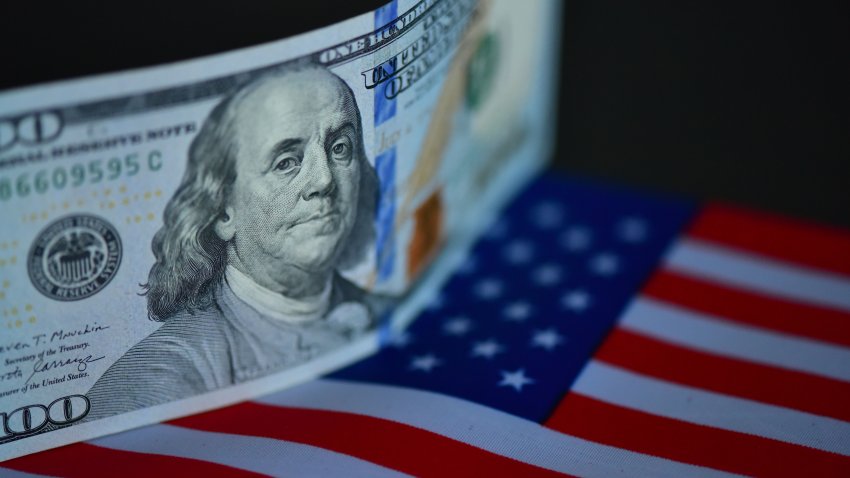 US dollar banknotes are captured in Fuyang City, Anhui Province, China, on December 11, 2025. (Photo by Costfoto/NurPhoto via Getty Images)