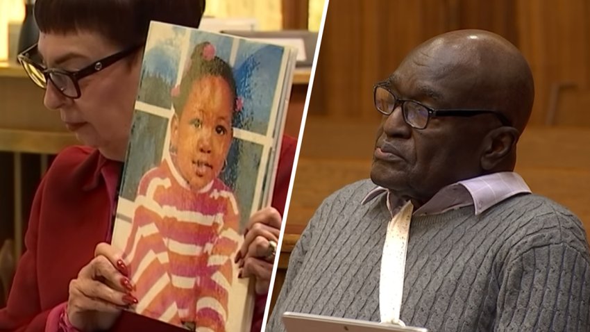 A prosecutor holds a photo of Quantisha Maycock at the resentencing trial of Harrel Braddy.